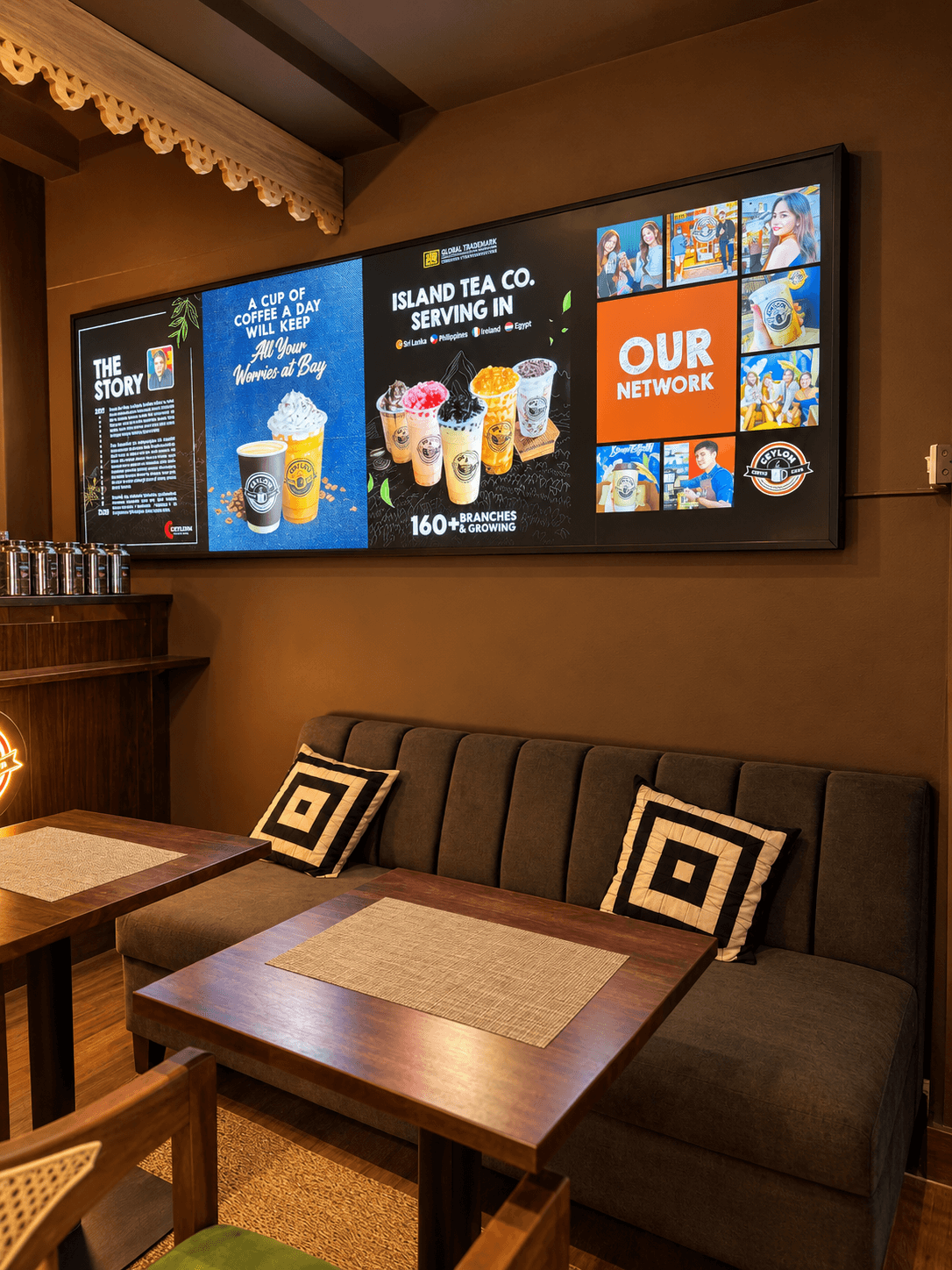 Island Tea Co. menu wall above café seating